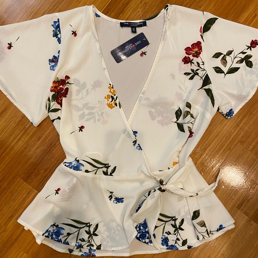 One clothing side tie shirt.